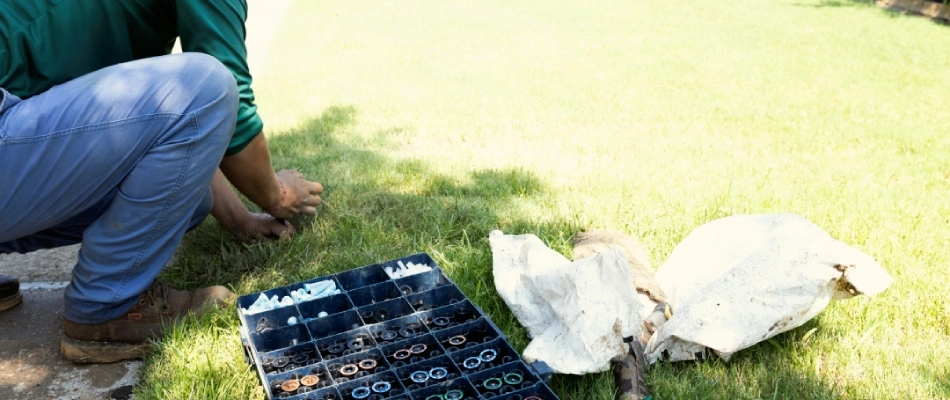 Cititurf professional repairing irrigation sprinkler system in Allen, TX.