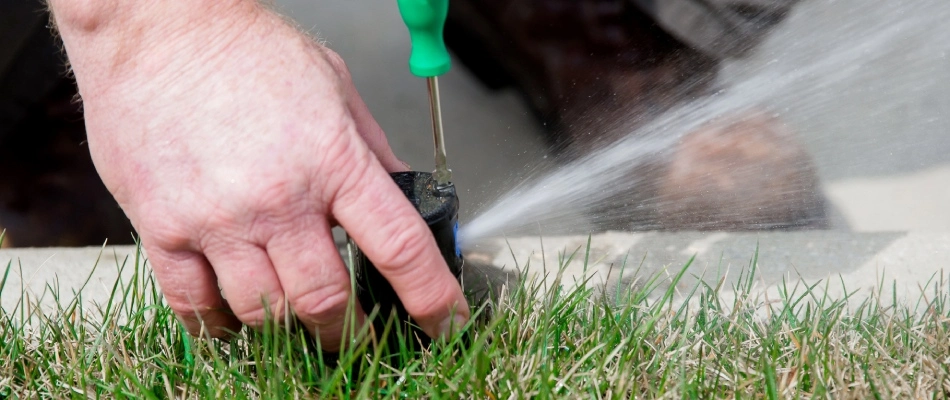 Professional repairing a leaky start up in Murphy, TX.