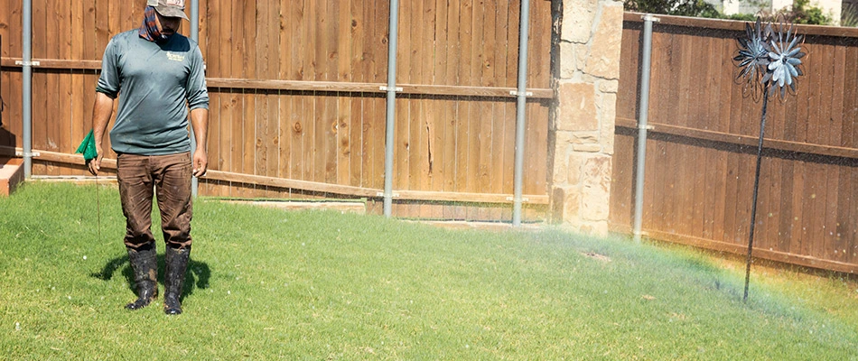 A technician checking on an irrigation system in Parker, TX.